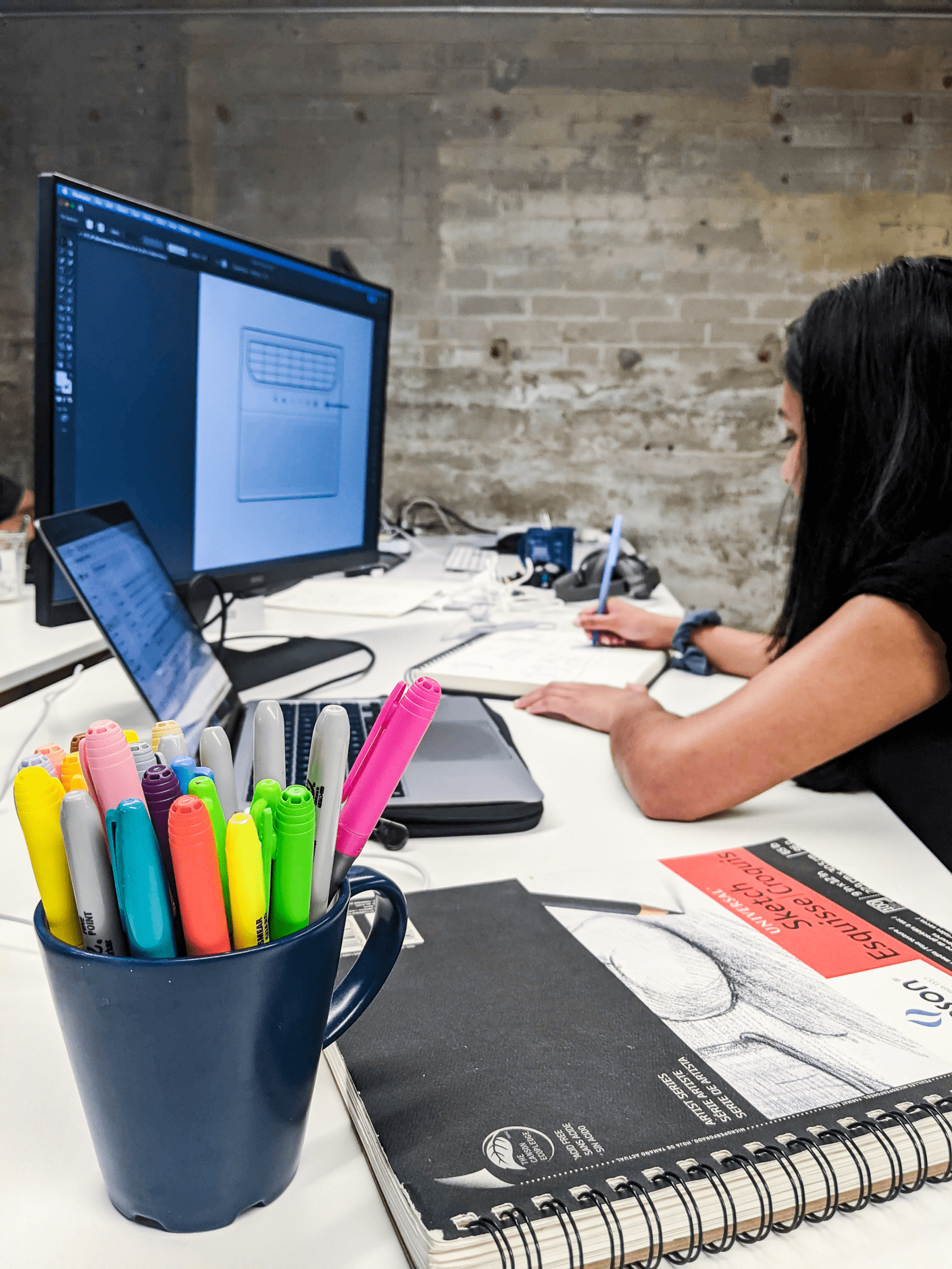 A designer creating high fidelity prototypes